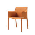 Orange saddle leather Cab dining chairs